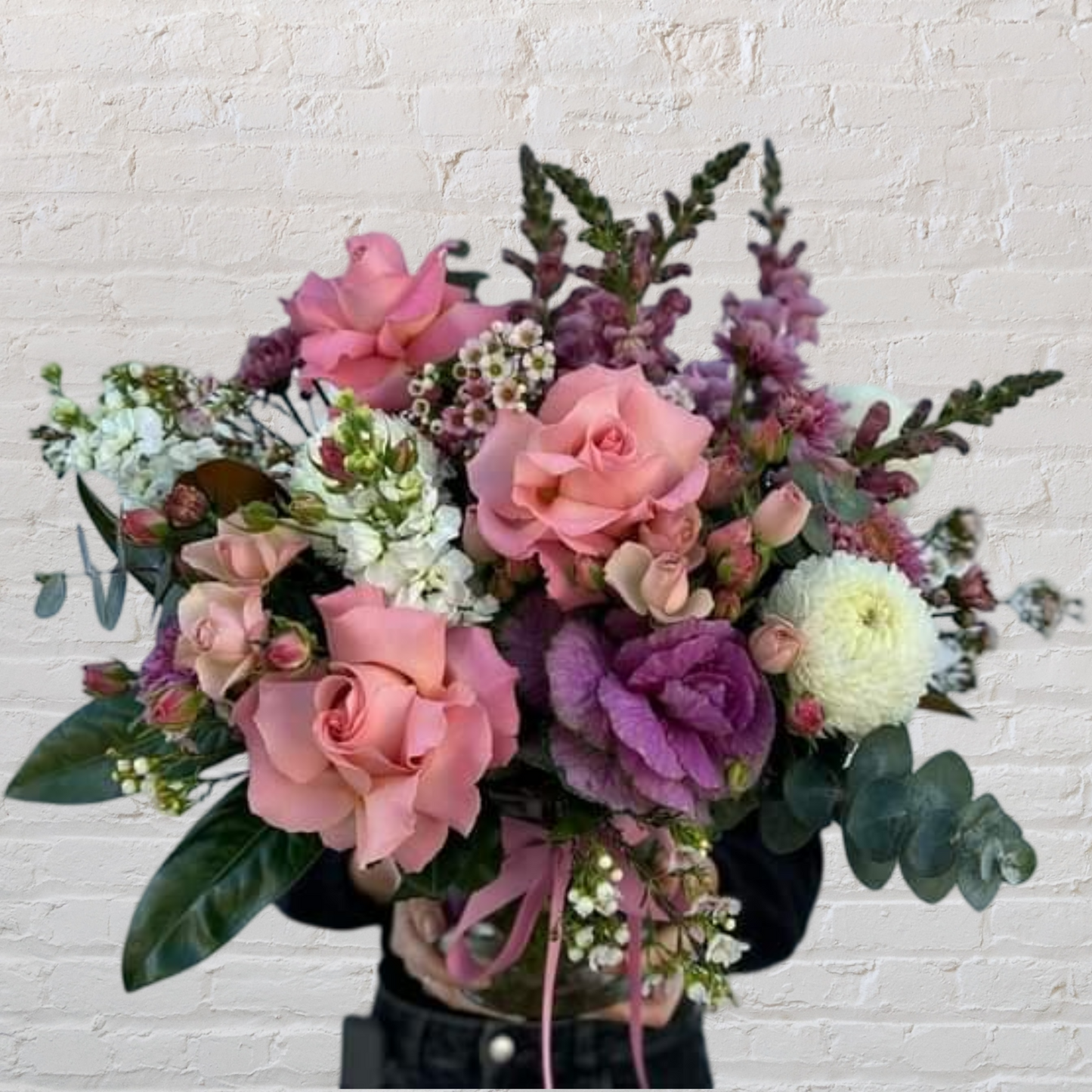 Seasonal pastel flowers in vase