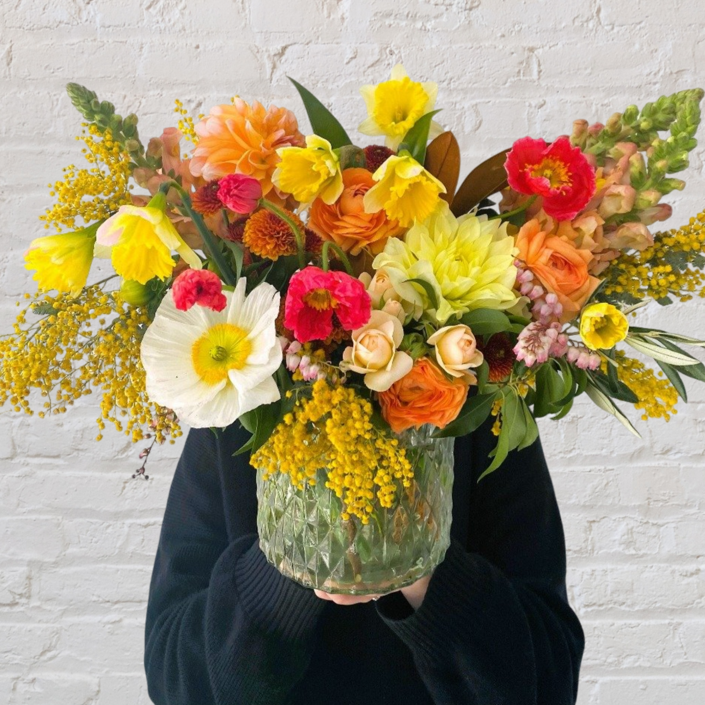 Seasonal bright flowers in vase