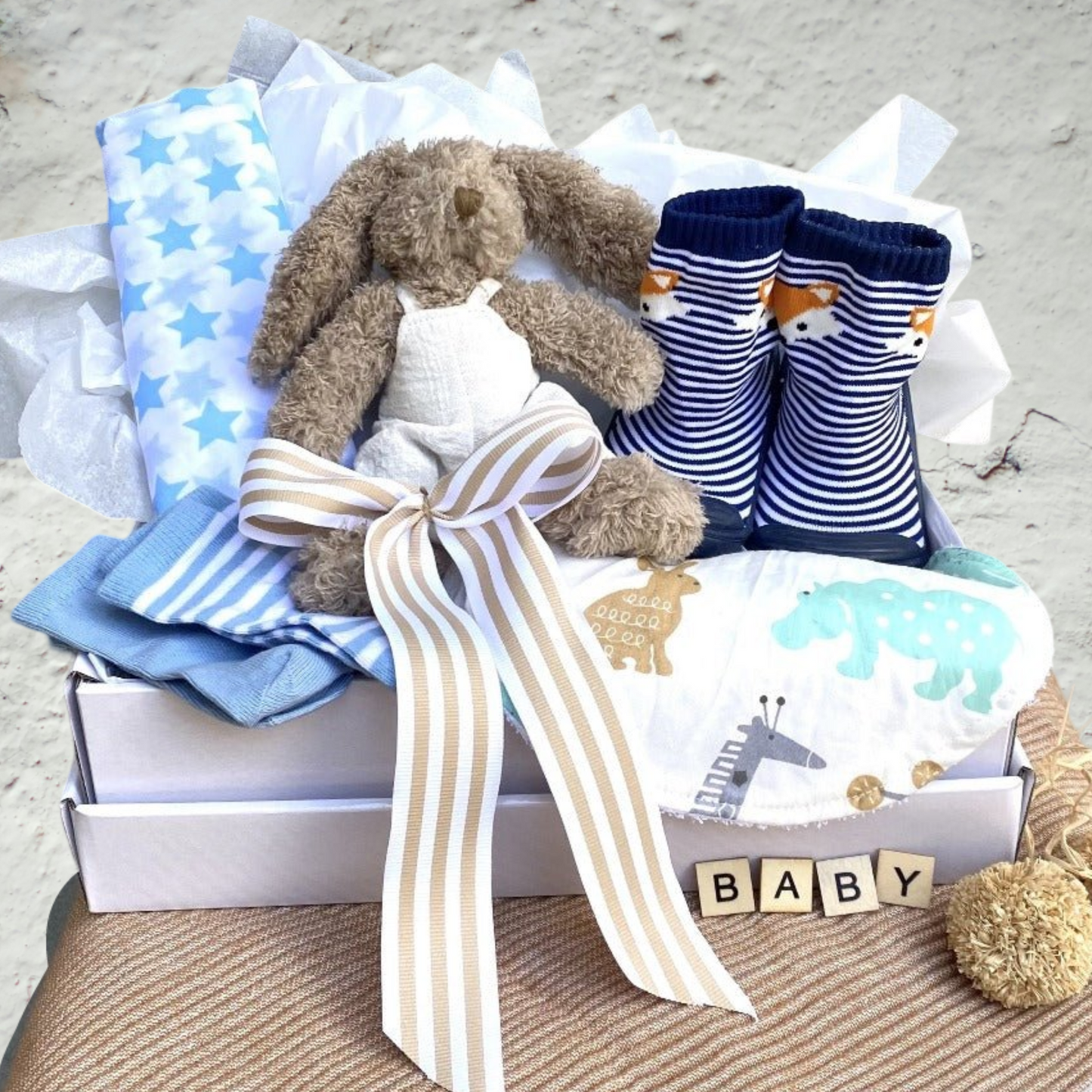 BABY GIFT, CLOTHERS AND SOFT TOY PRESENTED IN HAMPER