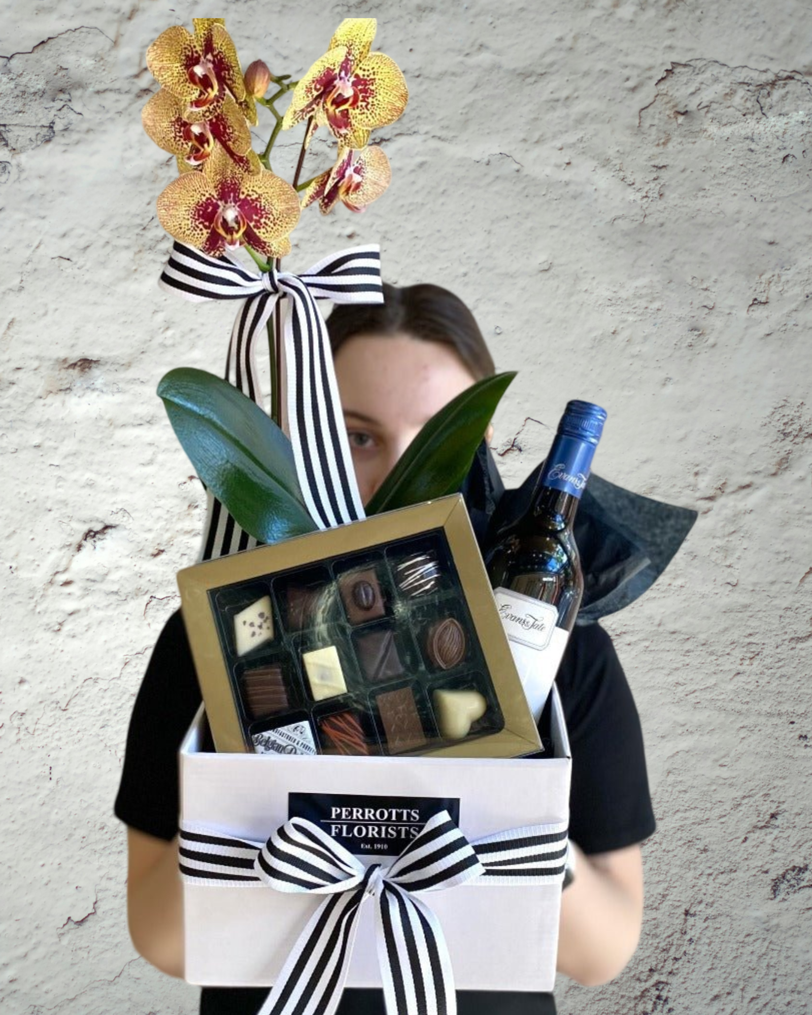 Assorted gift items presented as a hamper