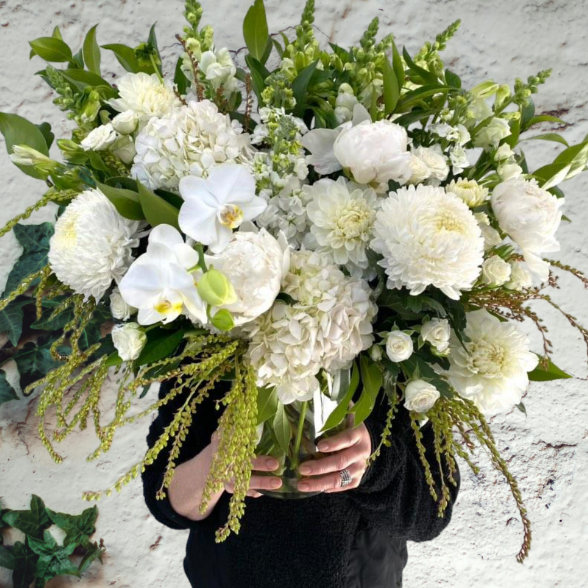 Seasonal white flowers in vase